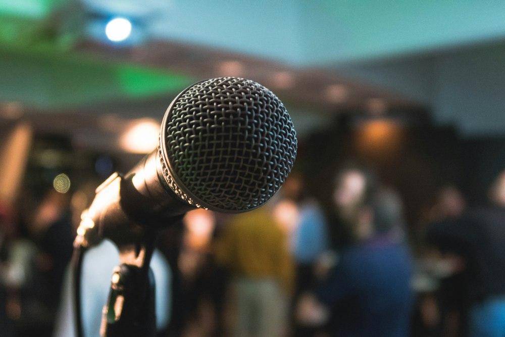 Professional speaker on stage with audience